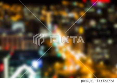 Illuminated crowded buildings at night 133328778