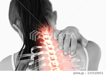 Highlighted spine of woman with neck pain Highlighted spine of woman with neck pain 133328931