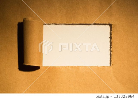 Directly above shot of torn brown paper 133328964