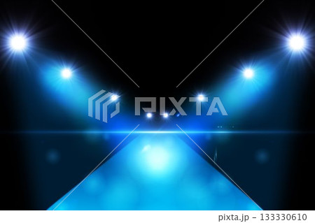 3D render showing glossy blue runway stage reaching viewer with spotlights casting lens flares 3D render showing glossy blue runway stage reaching viewer with spotlights casting lens flares 133330610