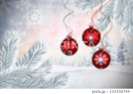 Baubles hanging over christmas scene 133330744