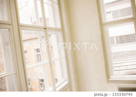 Flat design illustration is showing bright room with multi-pane white window wall and radiator Flat design illustration is showing bright room with multi-pane white window wall and radiator 133330745