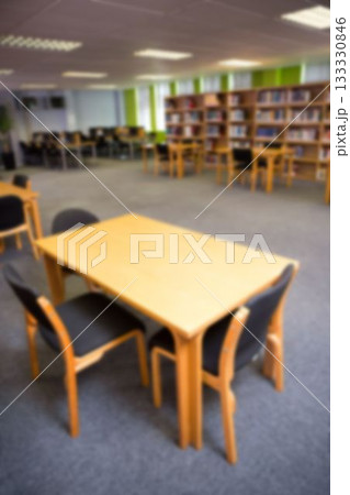 Table and chairs in library 133330846