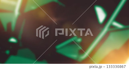Abstract neon-green beams are forming angular frames in blurred studio with orange-yellow flares 133330867