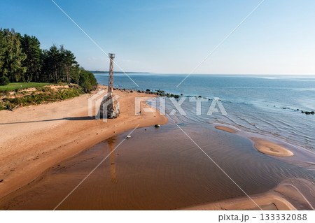old ruins of Kurmrags Lighthouse on the shore of the Rigas Gulf, Baltic sea, Latvia old ruins of Kurmrags Lighthouse on the shore of the Rigas Gulf, Baltic sea, Latvia 133332088