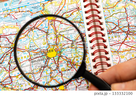 map of Bruxelles in Belgium through magnifying glass, travel destination concept 133332100