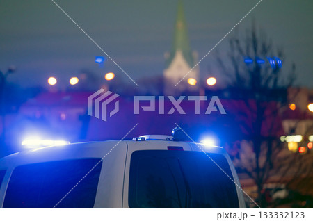 municipal police car with beacons on instead of "Stand With Ukraine" rally, evening lights 133332123