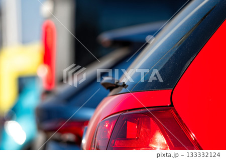 Close up of tail lights of cars standing in a row, aelective focus 133332124