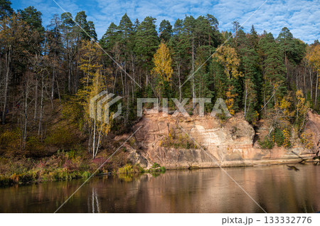 Devils rock and cave by the shores of the River Gauja, Sigulda, Latvia Devils rock and cave by the shores of the River Gauja, Sigulda, Latvia 133332776