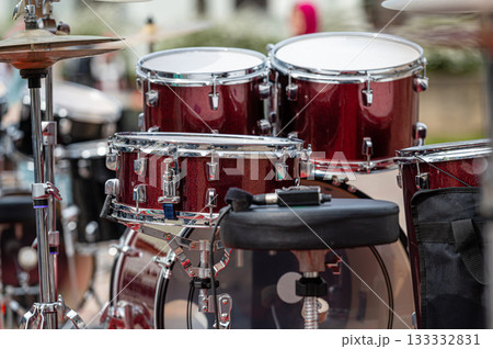 A set of plates in a drum set. At a concert of percussion music, selective focus, closeup 133332831