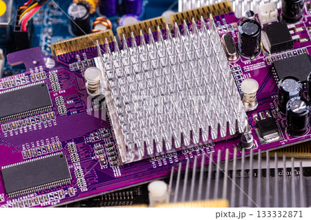 electronic circuit and cooling fin at computer video card, stack with used video cards, closeup electronic circuit and cooling fin at computer video card, stack with used video cards, closeup 133332871