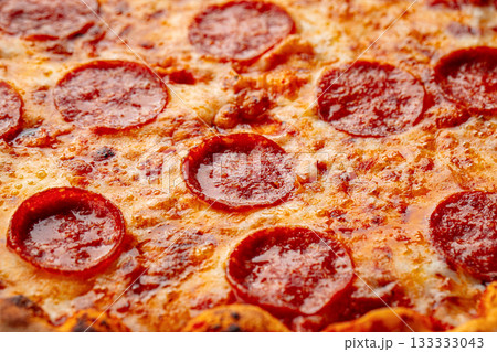 Pepperoni pizza with melted cheese Pepperoni pizza with melted cheese 133333043