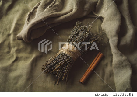 A bouquet of lavender and a cinnamon stick are on the table. AI-generated content. 133333392