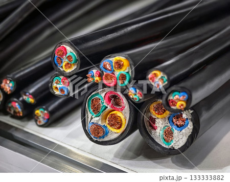 Variety of electrical wires and cables showing different colors and types in a detailed view on the workbench 133333882