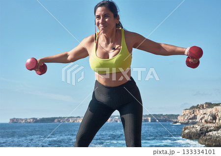 young woman doing sport in fitness center young woman doing sport in fitness center 133334101