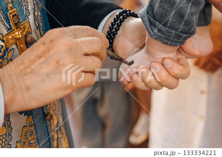 Ceremony of blessing for a child in a cultural setting Ceremony of blessing for a child in a cultural setting 133334221