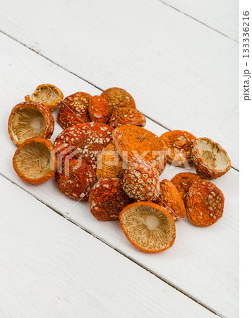 Dried fly agaric on a white background. 133336216