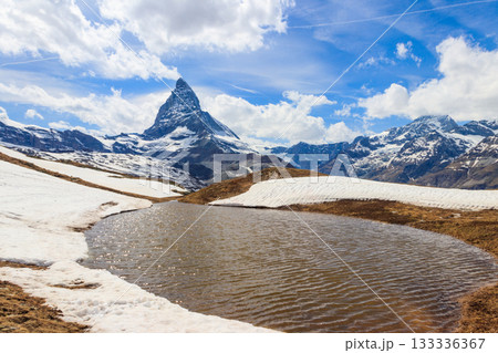 View of the Matterhorn with mountain lake near Zermatt in Valais canton, Switzerland View of the Matterhorn with mountain lake near Zermatt in Valais canton, Switzerland 133336367