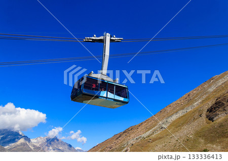 Overhead cable car to the Rothorn mountain near Zermatt in Switzerland 133336413