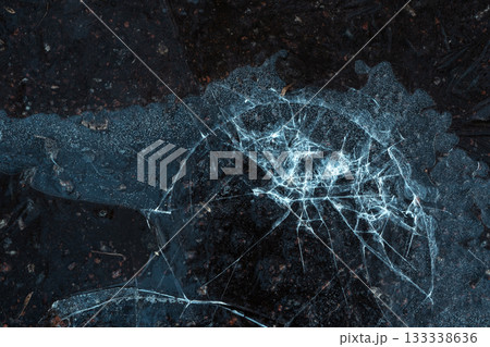 Frozen Abstract Pattern on Cracked Ice Surface Frozen Abstract Pattern on Cracked Ice Surface 133338636