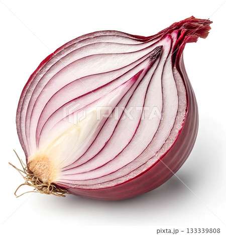 A vibrant red onion is sliced in half revealing concentric rings of white and purple on a white background A vibrant red onion is sliced in half revealing concentric rings of white and purple on a white background 133339808