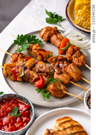 Assortment of grilled bbq meat and vegetables Assortment of grilled bbq meat and vegetables 133340198