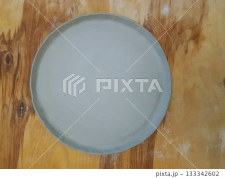 Handmade Greenware Clay Plate on Wood Ready for Art 133342602