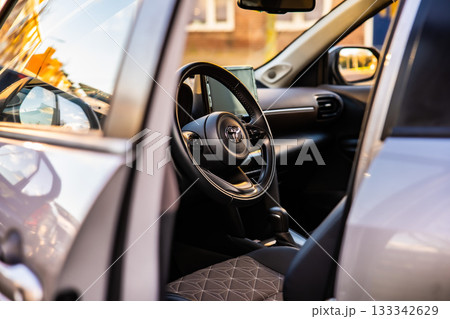 Netherlands - November 2025 : Toyota Yaris Cross interior. Hybrid subcompact crossover SUV produced Toyota. interior design new Toyota Yaris Cross model design inside the cabin. 133342629