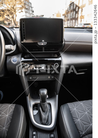 Netherlands - November 2025 : Toyota Yaris Cross interior. Hybrid subcompact crossover SUV produced Toyota. interior design new Toyota Yaris Cross model design inside the cabin. 133342646