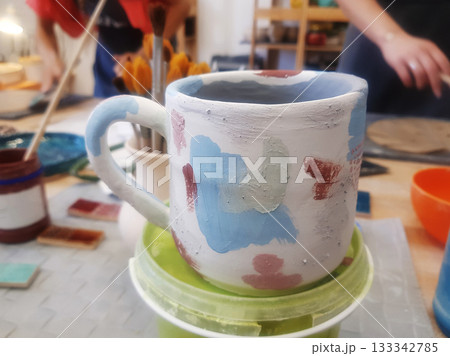 Artistic Pottery Mug: Studio Scene Crafting Process Artistic Pottery Mug: Studio Scene Crafting Process 133342785