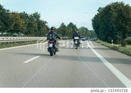 biker on the road biker on the road 133343156