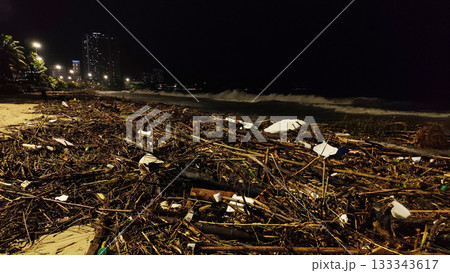 Nha Trang beach covered with storm debris during rainy season Nha Trang beach covered with storm debris during rainy season 133343617