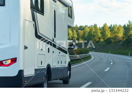 white trucks on highway road white trucks on highway road 133344222