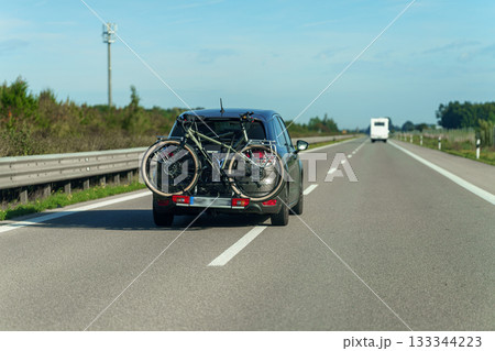 retro motorbike on asphalt road 133344223