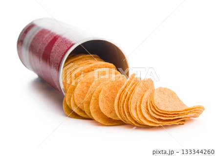 Crispy potato chips isolated on white background. 133344260