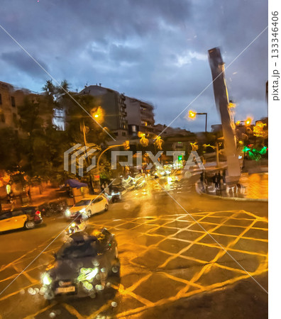 Rainy Night City Street with Blurred Lights 133346406