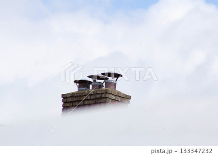 Chimey surrounded by clouds in Tolkamer 133347232