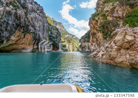 Boat trip on turquoise water of mountain canyon, Verdon Gorge in french Alps, Provence France. 133347598