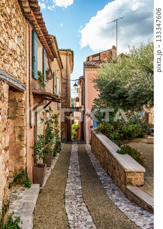 The narrow streets of the old village Moustiers Sainte Marie in France The narrow streets of the old village Moustiers Sainte Marie in France 133347606