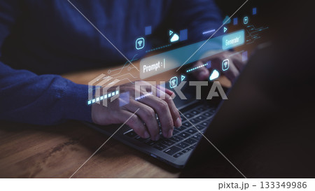 Artificial intelligence and machine learning concept with man typing prompt on laptop computer, AI content generation, digital innovation, natural language processing, and futuristic technology. Artificial intelligence and machine learning concept with man typing prompt on laptop computer, AI content generation, digital innovation, natural language processing, and futuristic technology. 133349986
