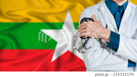 Doctor with stethoscope on Myanmar flag. Doctor holding stethoscope on Myanmar flag 133352570