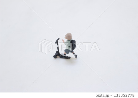 Miniature Scooter Rider Toy Figure With Backpack 133352779
