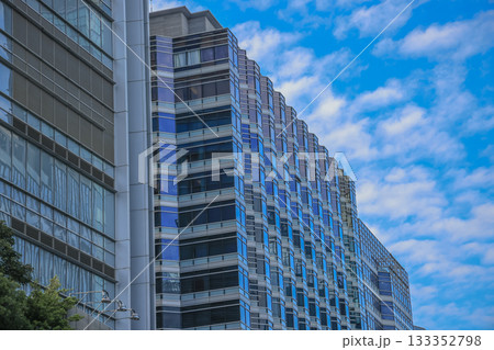 Glass Office Building Facade Shaped by Repeating Blue Windows Nov 15 2025 133352798