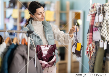 Regular customer Armenian woman chooses color and style of bra Regular customer Armenian woman chooses color and style of bra 133353283