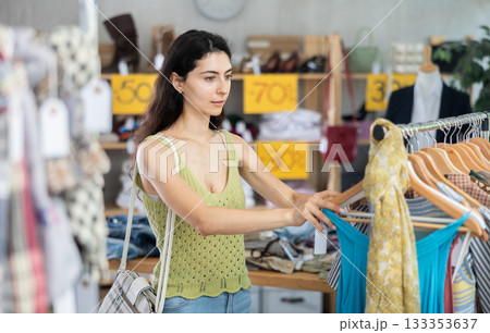 Armenian woman chooses a summer dress on sale 133353637
