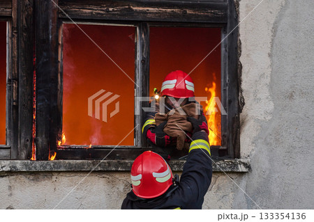 Firefighters battling flames in burning building, risking lives, firemen extinguishing blaze, emergency response, danger, rescue operation, dramatic scene, firefighters in action Firefighters battling flames in burning building, risking lives, firemen extinguishing blaze, emergency response, danger, rescue operation, dramatic scene, firefighters in action 133354136