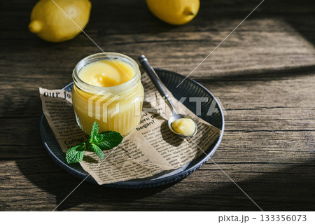 Homemade lemon curd in a glass jar 133356073