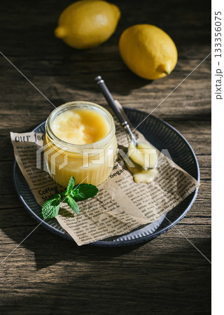 Homemade lemon curd in a glass jar 133356075