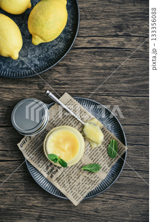 Homemade lemon curd in a glass jar Homemade lemon curd in a glass jar 133356088