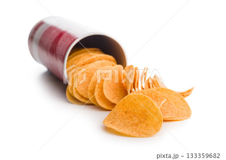 Crispy potato chips isolated on white background. 133359682